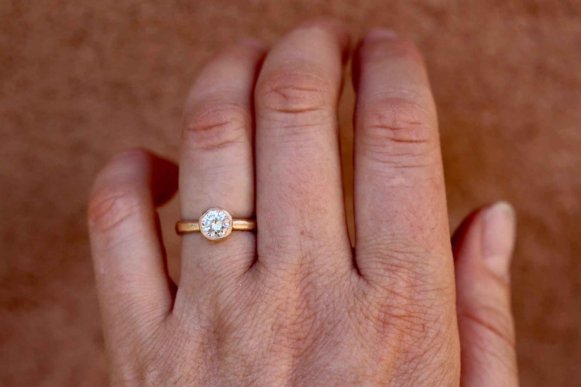 solitaire 1ct ethical diamond earthy organic texture sandcast wedding engagement ring paige devlin methow valley washington wedding jeweler alternative unique nature inspired ring 14kt recycled gold artisan handcrafted